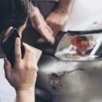 insurance agent working during on site car accident claim process people and car insurance claim 850x550 1